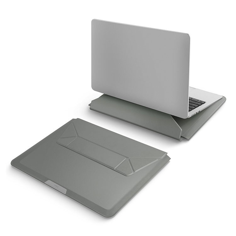 На фото изображено Чехол Uniq для ноутбуков 14" Oslo V.2 PU leather Magnetic Laptop sleeve/foldable stand, зеленый